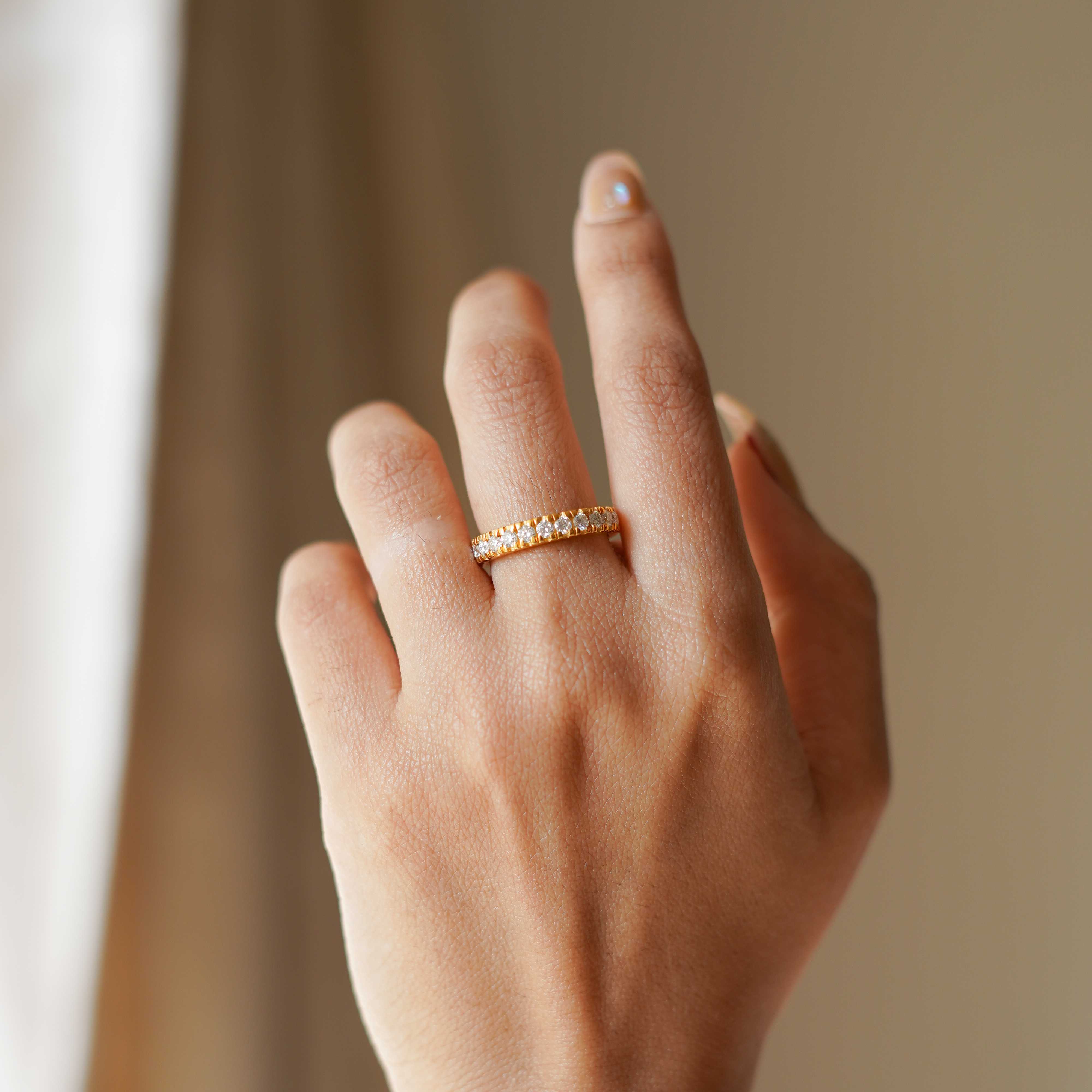 Moissanite And Gold Eternity Ring